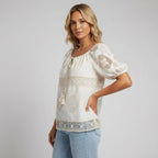 Relaxed Embroidered Blouse with Tassels